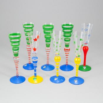 ANNE NILSSON, 11 glasses and a glass candlestick, 'Clown' and 'Gerbera', Orrefors.