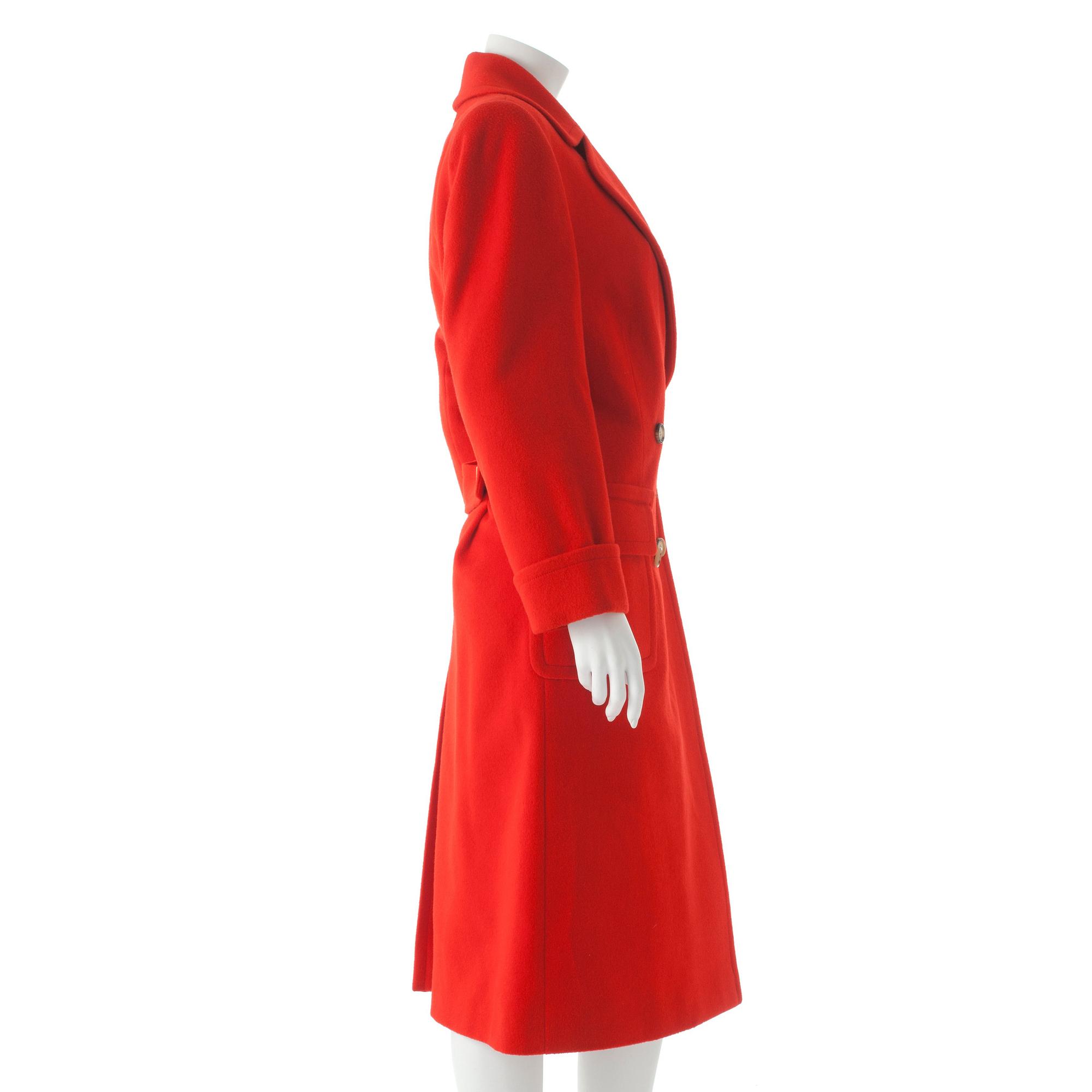 CÉLINE, a red cashmere and wool coat.