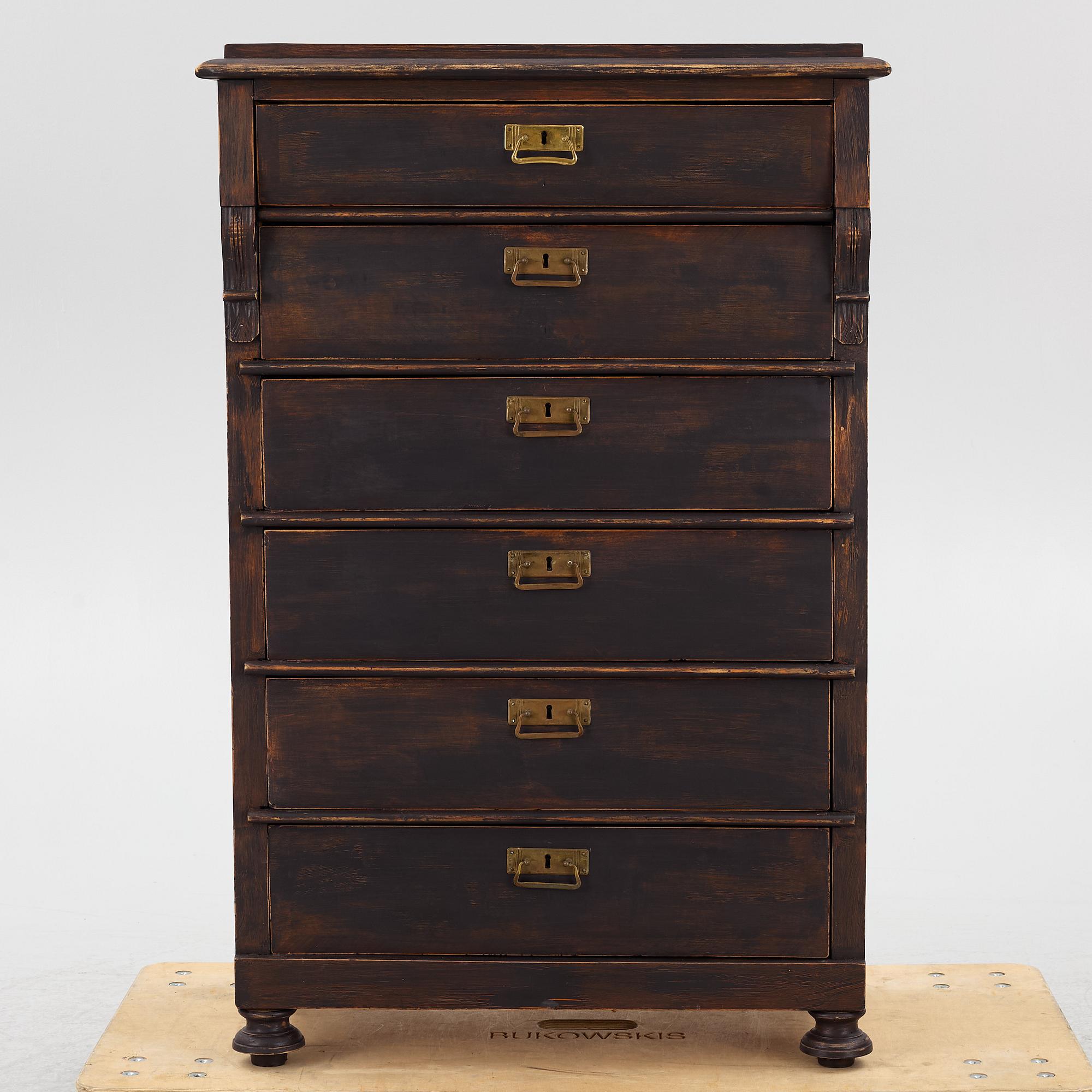 A chest of drawers, circa 1900.