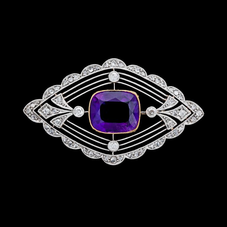 An amethyst and diamond brooch, c. 1905.