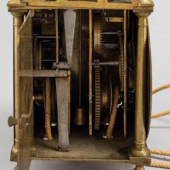 A late 17th or early 18th century lantern clock signed J Windmills London.