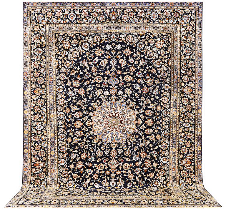 A Kashan carpet, c. 413 x 308 cm.