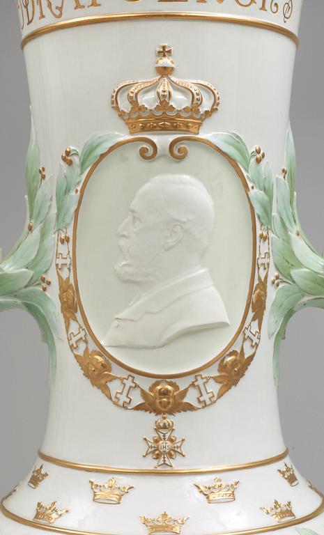 A Karl Lindström porcelain vase, decorated with the portrait of King Oscar II with his motto, Rörstrand 1897.