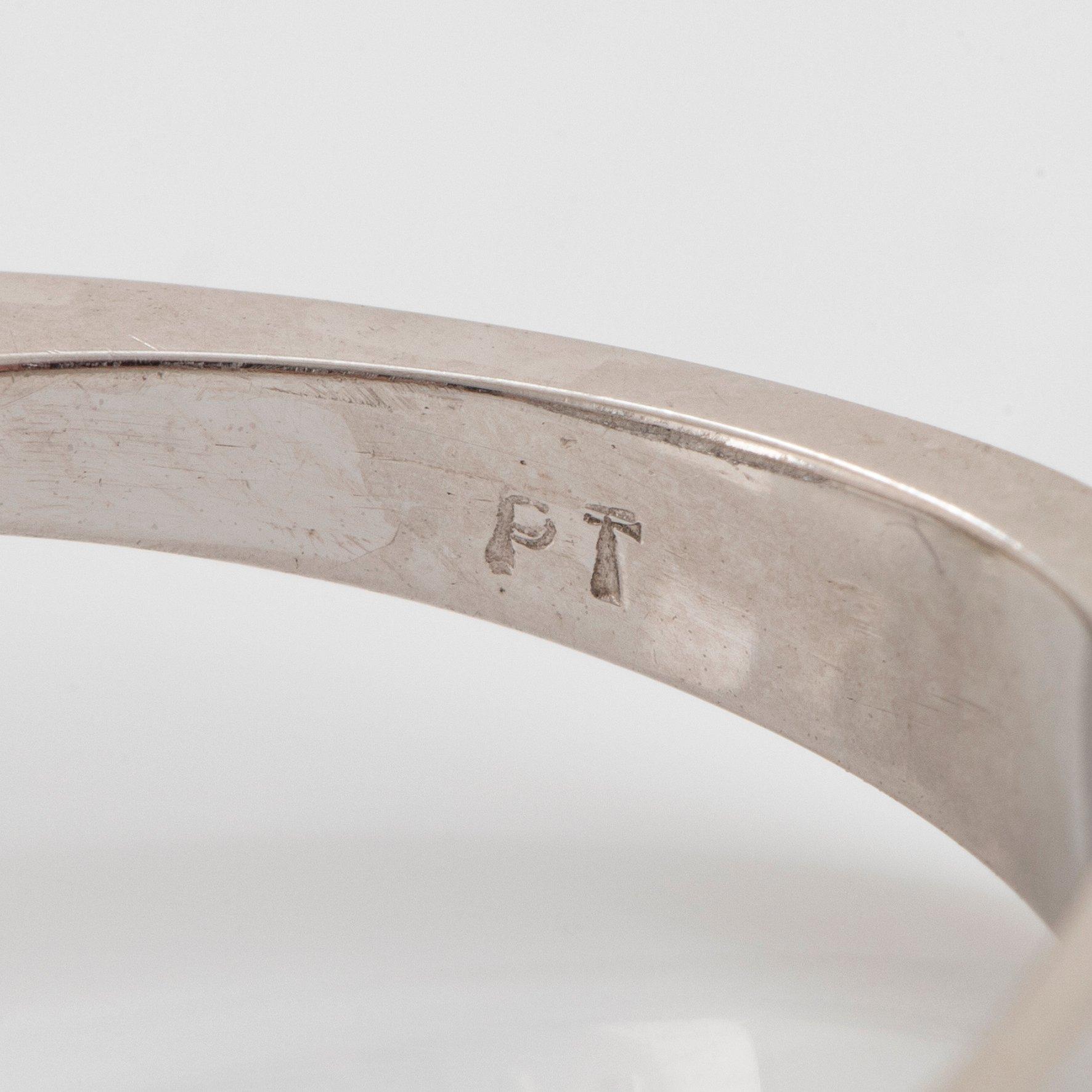 A platinum ring set with an old-cut diamond weight ca 4.00 cts quality ca N/O si.