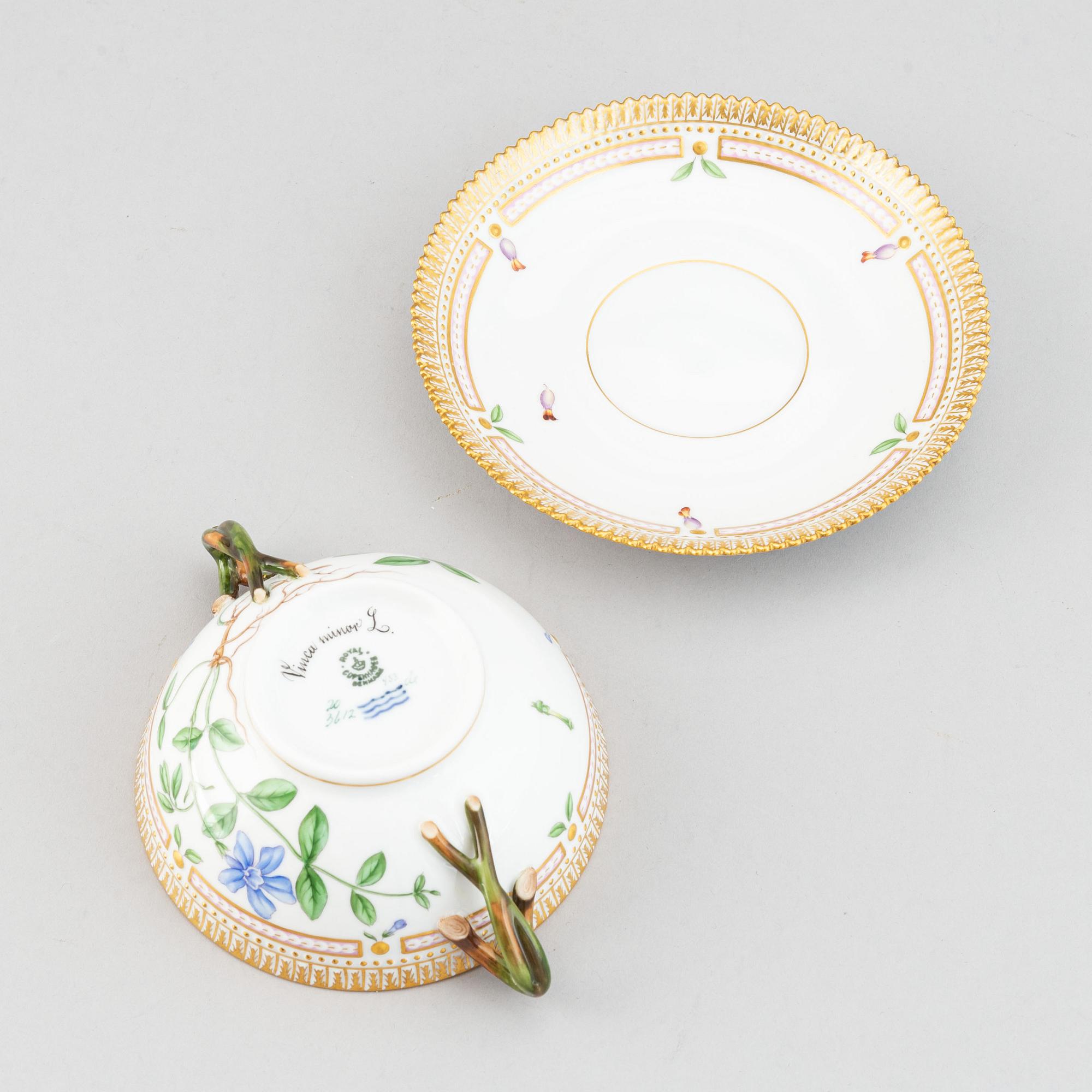Royal Copenhagen, A 'Flora Danica' porcelain soup cup with saucer.