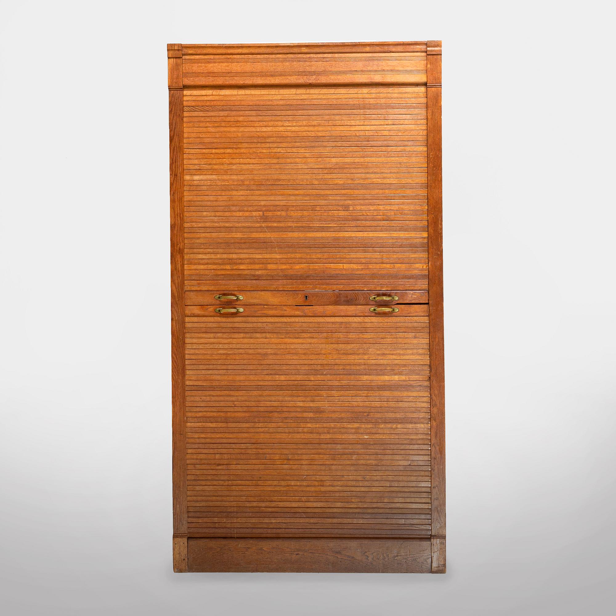 A mid 20th century oak archive cabinet.