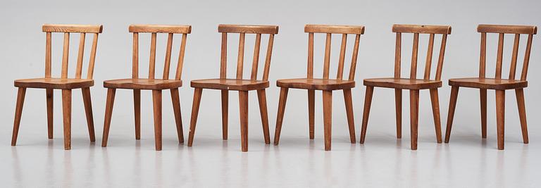 Axel Einar Hjorth, a set of six stained pine 'Utö' chairs, Nordiska Kompaniet, Sweden 1930s.