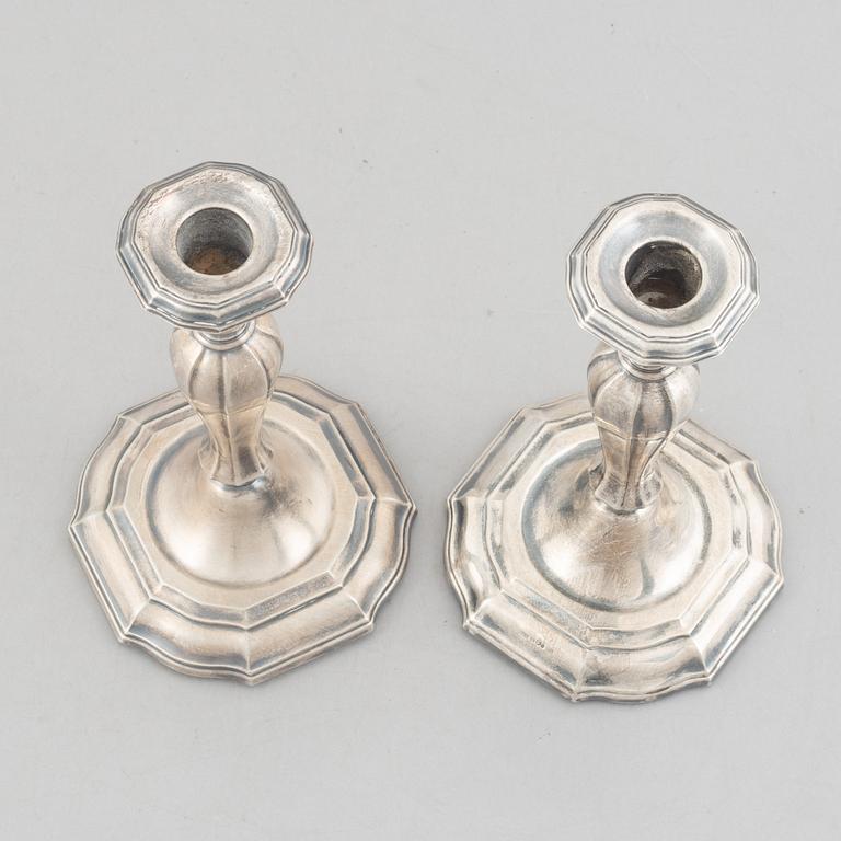 Two pairs of Swedish silver candlesticks, including Eric Löfman, MGAB, Uppsala 1979-1982.