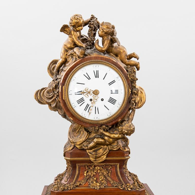A louis XV style long case clock later part of the 19th century.