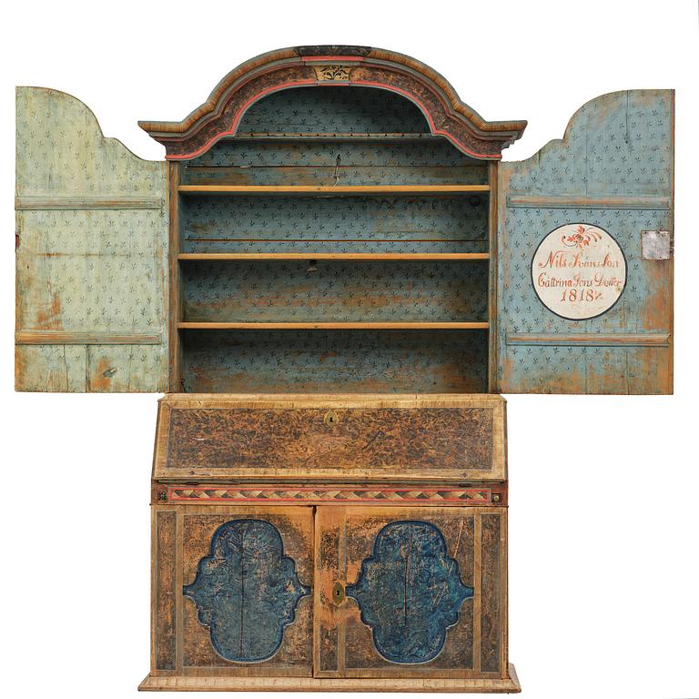 A polychrome-painted folk art cabinet from Värmland, Sweden, dated 1818.