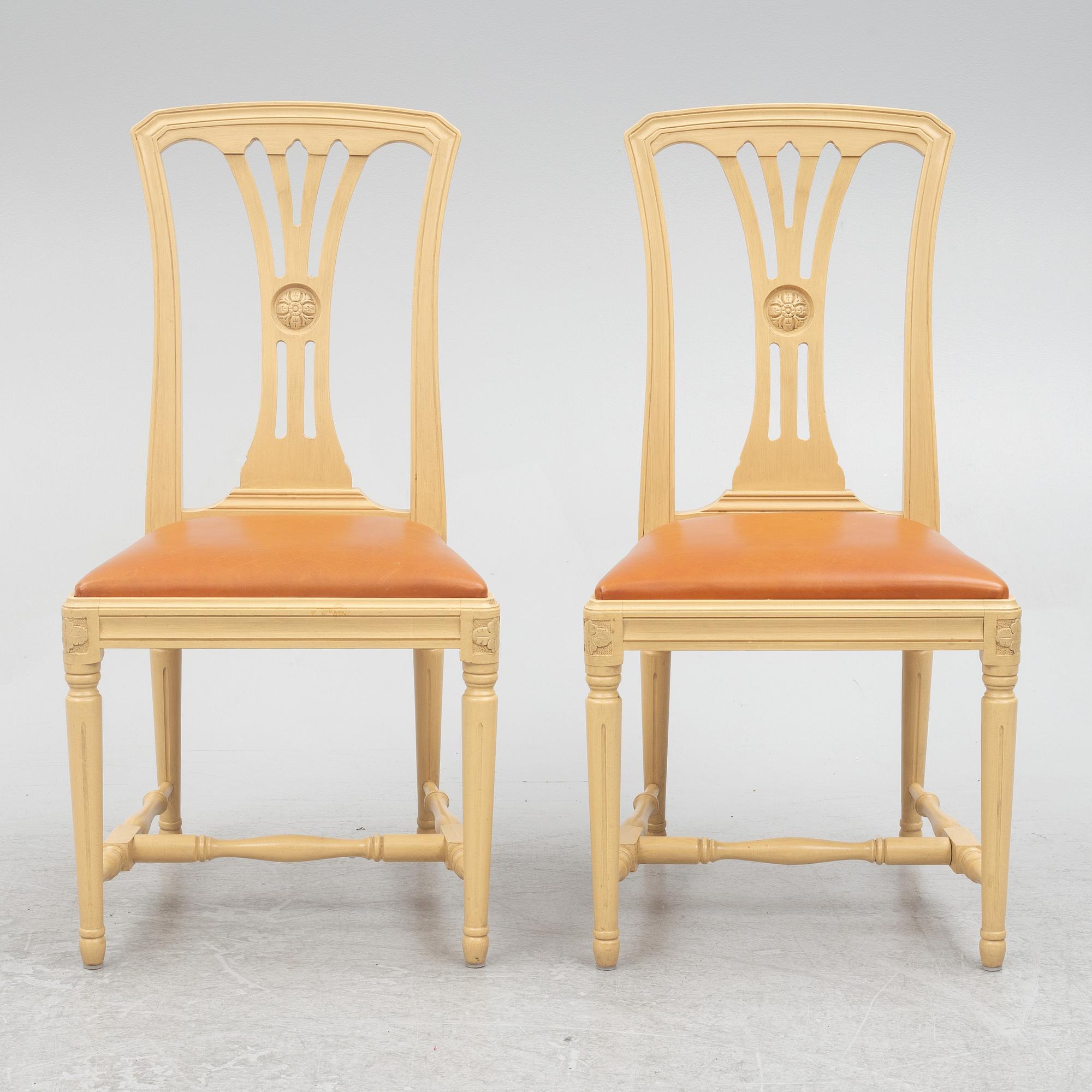 A Gustavian style dining table with six dining chairs, Sweden, 21st century.