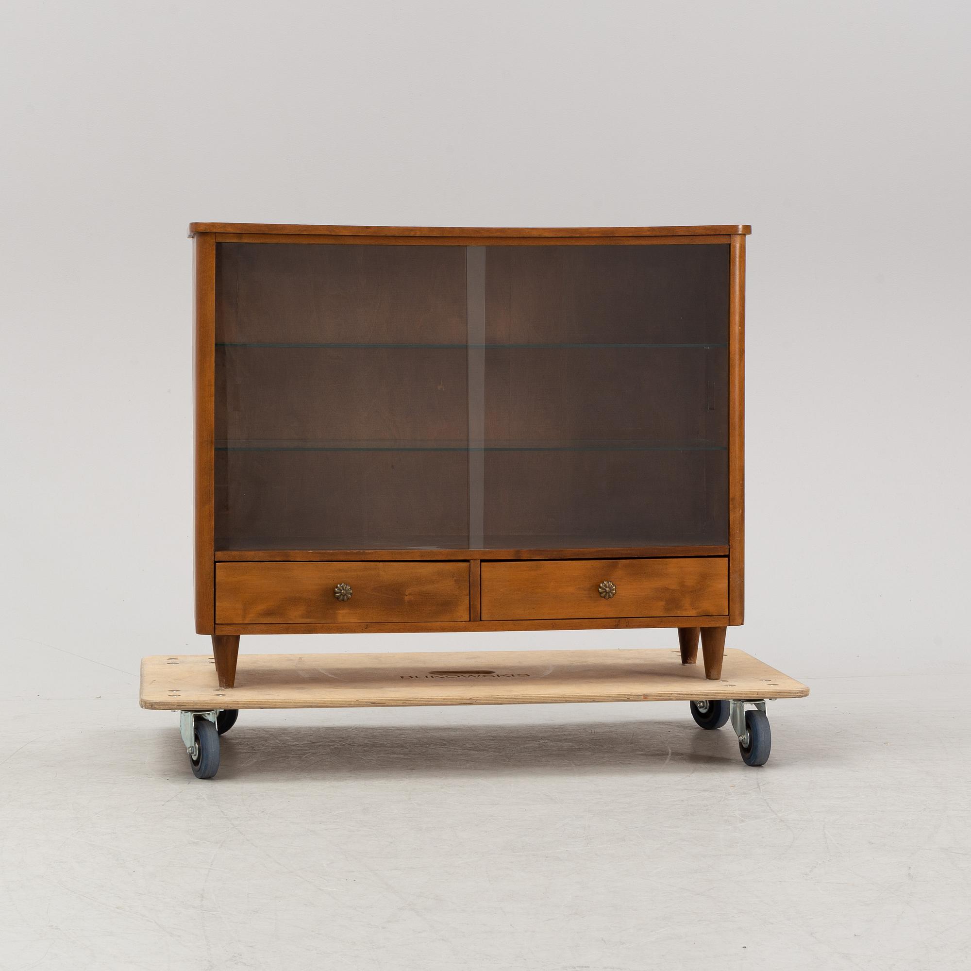 A Swedish Modern cabinet, 1940-50s.