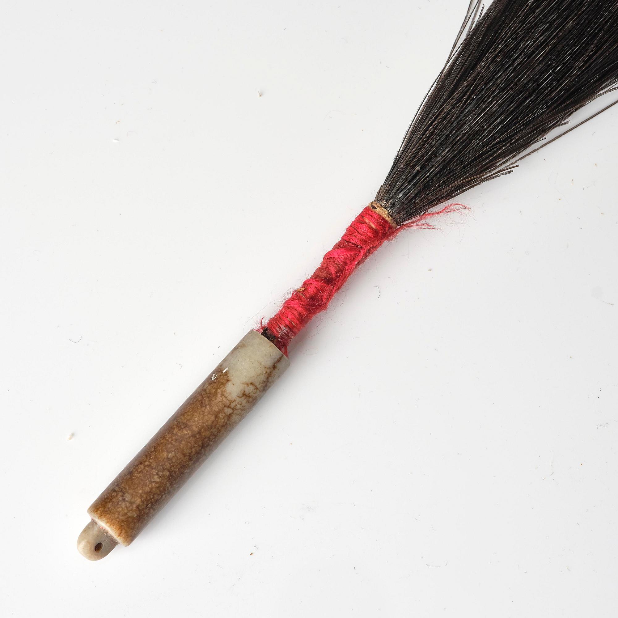 Two boxes with a mandarin's summer hat and black satin autumn hat and feather with six mandarin hat insignias.