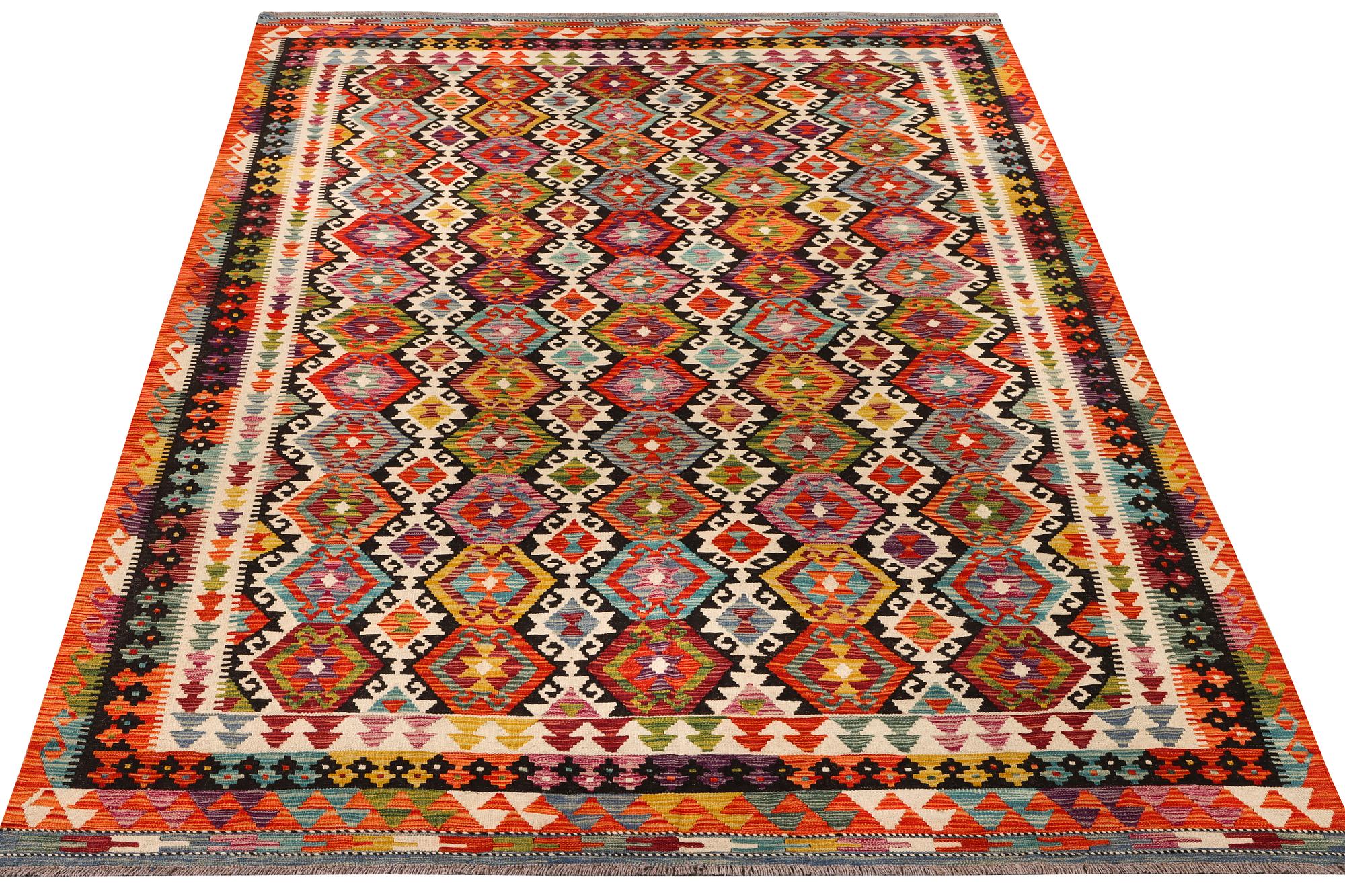 An Afghan Kilim carpet, c. 298 x 202 cm.