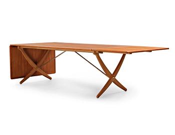 Hans J. Wegner, a teak, beech and brass dining table by Andreas Tuck, "AT-314", Denmark 1950-60's.