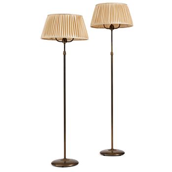 Nordiska Kompaniet, a pair of Swedish Grace floor lamps, 1930's.