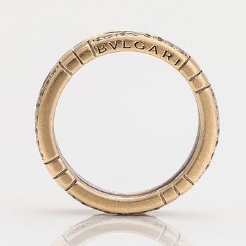 Bulgari, an 18K gold 'Parentesi' ring with diamonds, ca 0.25 ct in total.