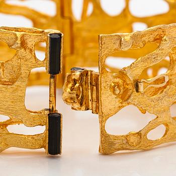 Björn Weckström, an 18K gold and tourmaline 'Sacrificial fire' bracelet. Lapponia 1971.