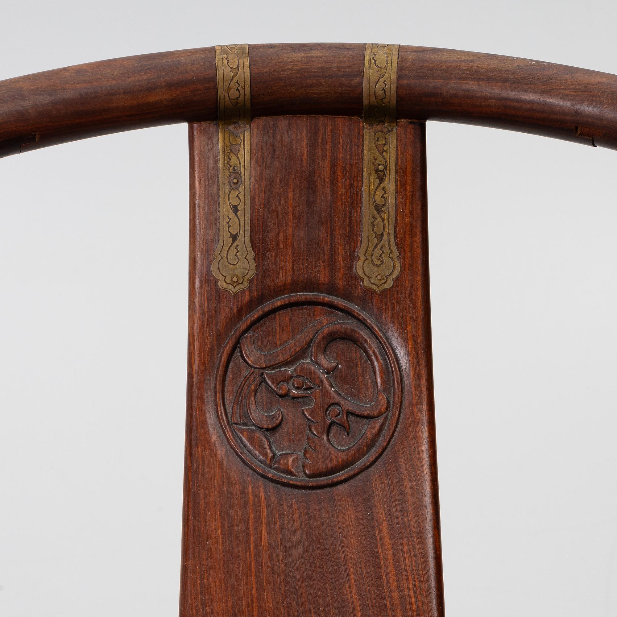 A Chinese hardwood folding chair, 20th century.