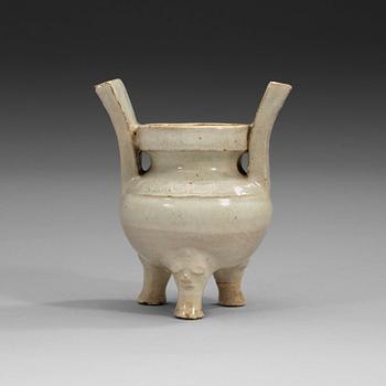 A pale grey-bluish glazed tripod censer with decor in relief, and archaistic mark, Ming dynasty (1368-1644).