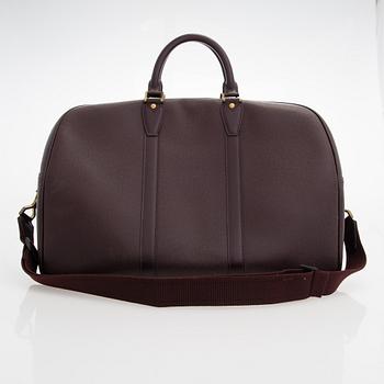 Louis Vuitton, 'Taiga Kendall PM' Bag.