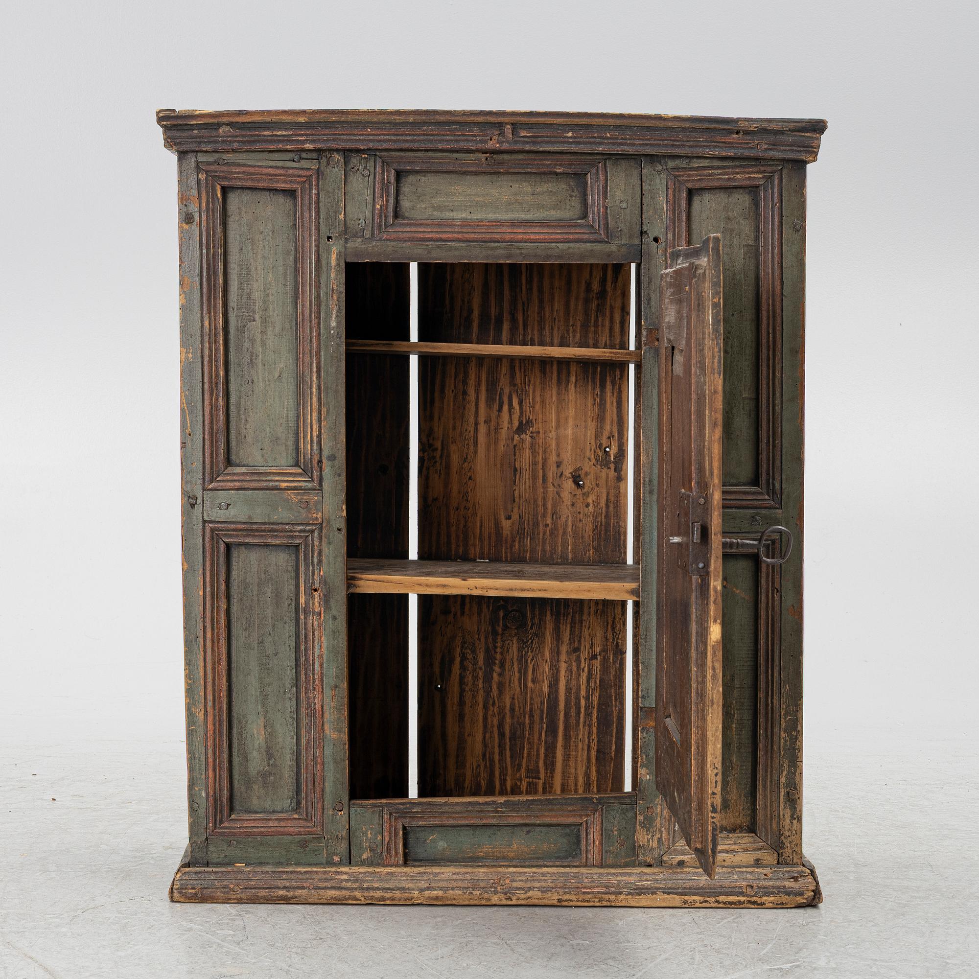 A wall-hanged cabinet, Sweden, dated 1796.