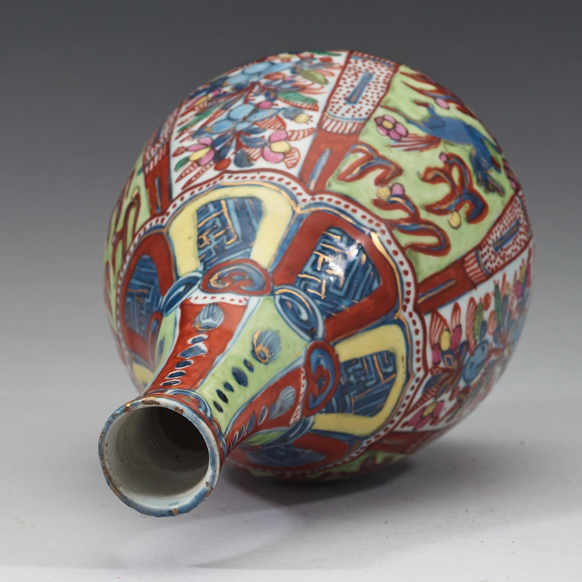 A 'clobbered' bottle vase, Ming dynasty, Wanli (1572-1620).