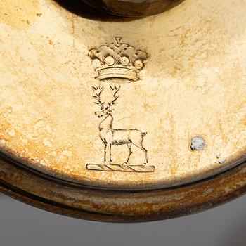 An English silver-gilt teapot with stand and burner, mark of Richard Sibley I, London 1825.