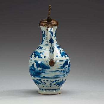 A blue and white Transitional ewer, 17th Century.