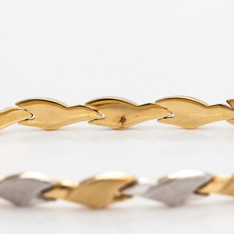 A 14K gold necklace and bracelet.