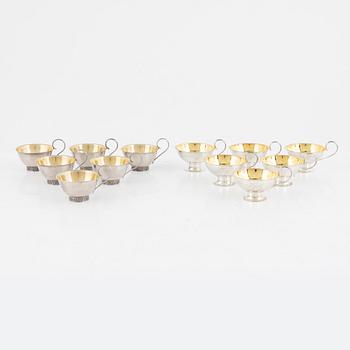 A set of twelve Swedish silver punsch mugs, including Stockholm 1965.