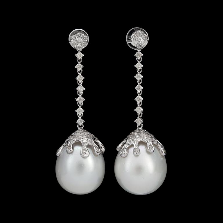 A pair of cultured South Sea pearl and diamond earrings. Diamonds total carat weight circa 1.33 cts.