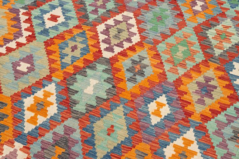 A kilim carpet, c. 295 x 203.