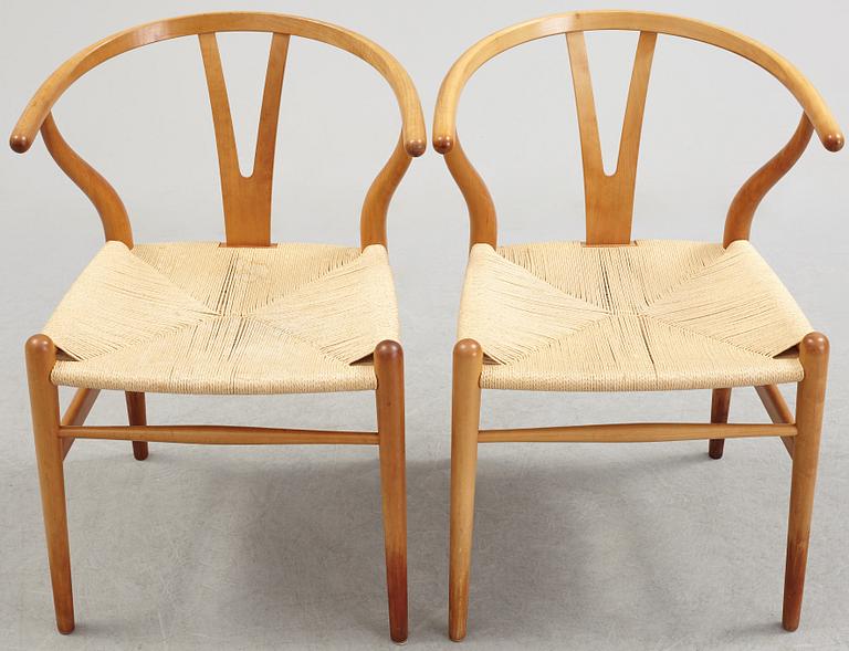 A set of four + two armchairs 'Y-chair' by Hans J Wegner, Carl Hansen & Son, Denmark.