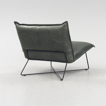 A contemporary lounge chair by Jess Design.