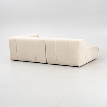 A modular "Rosso" sofa, Layered.