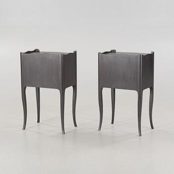 A pair of rococo style bedside tables from the second half of the 20th century.