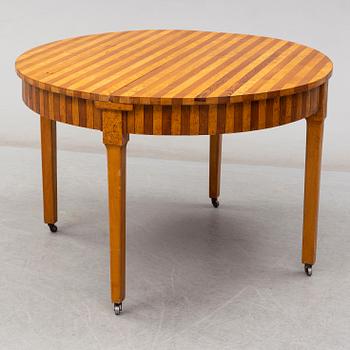 a dining table from the early 20th century.