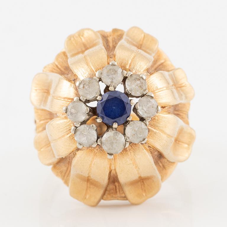 Ring, Hans Scherlund, 18K gold with white and blue stones.