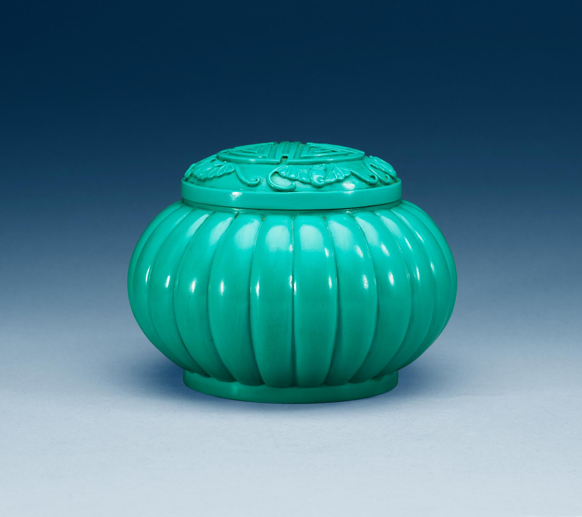 A turkoise coloured Beijing glass suger bowl with cover, Qing dynasty.
