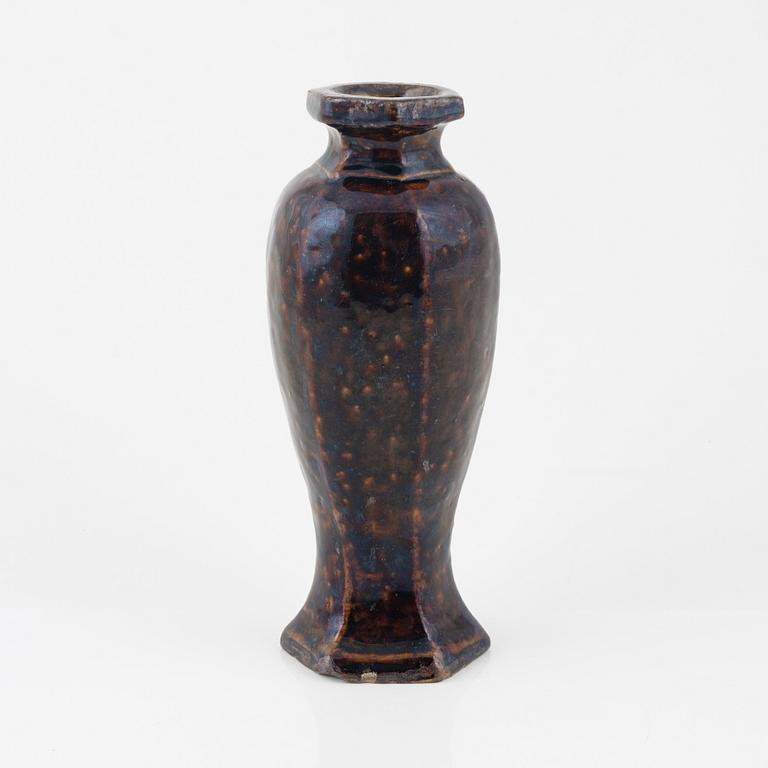 A brown glazed vas, Ming dynasty (1368-1644).