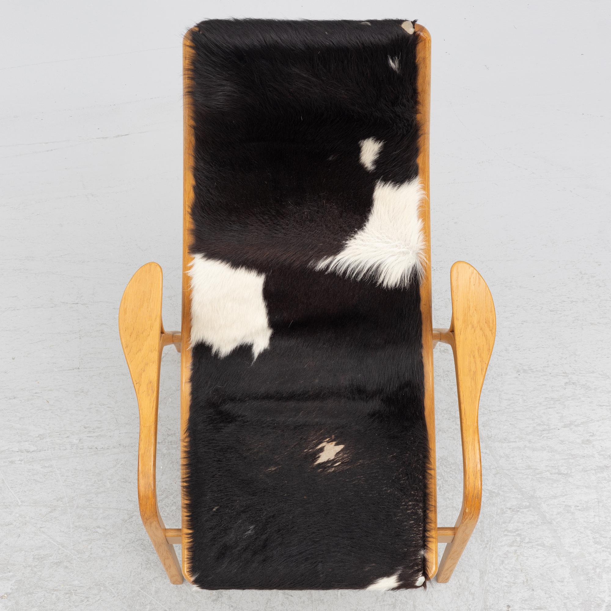 Yngve Ekström, an armchair with footstool, Lamino, Swedese.