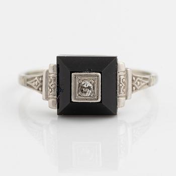 18K white gold, onyx with round brilliant cut diamond ring.