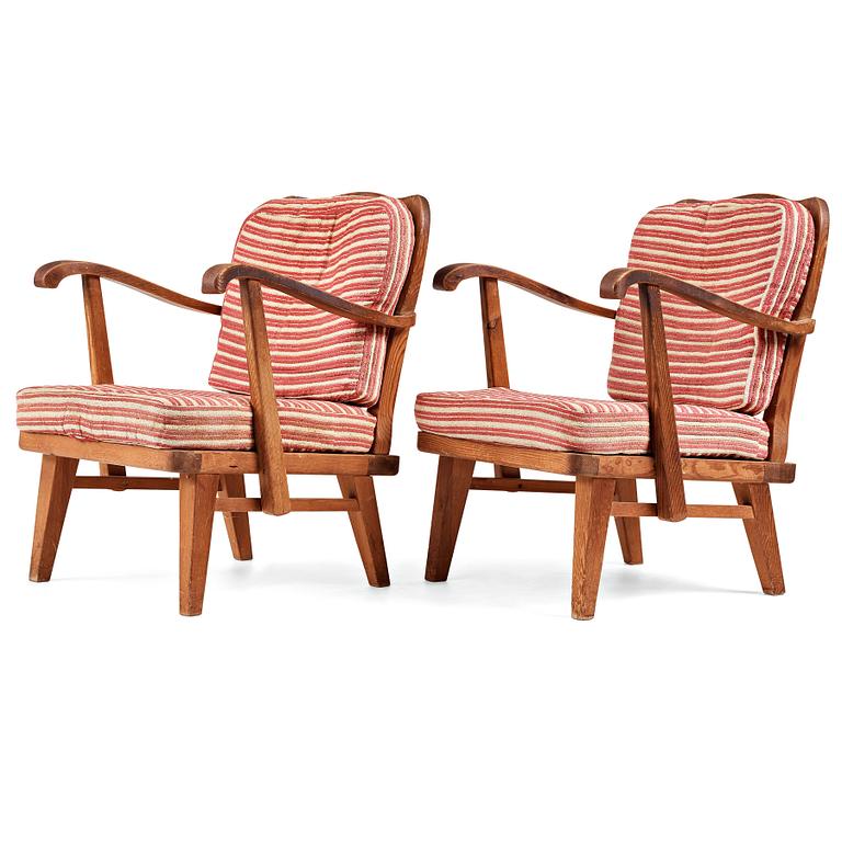 Nordiska Kompaniet, a pair of "sportstugemöbler" stained pine easy chairs, Sweden 1930-40's.