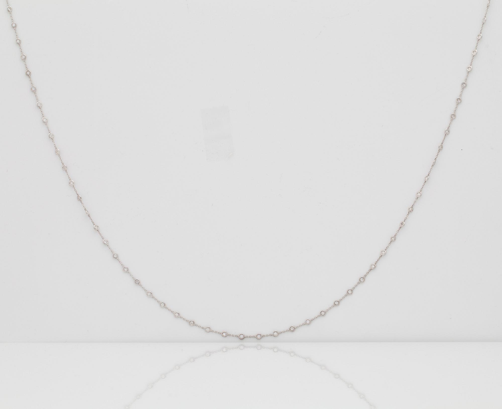 A btilliant cut diamond necklace. Total carat weight circa 4.95 cts. Quality circa H/SI.