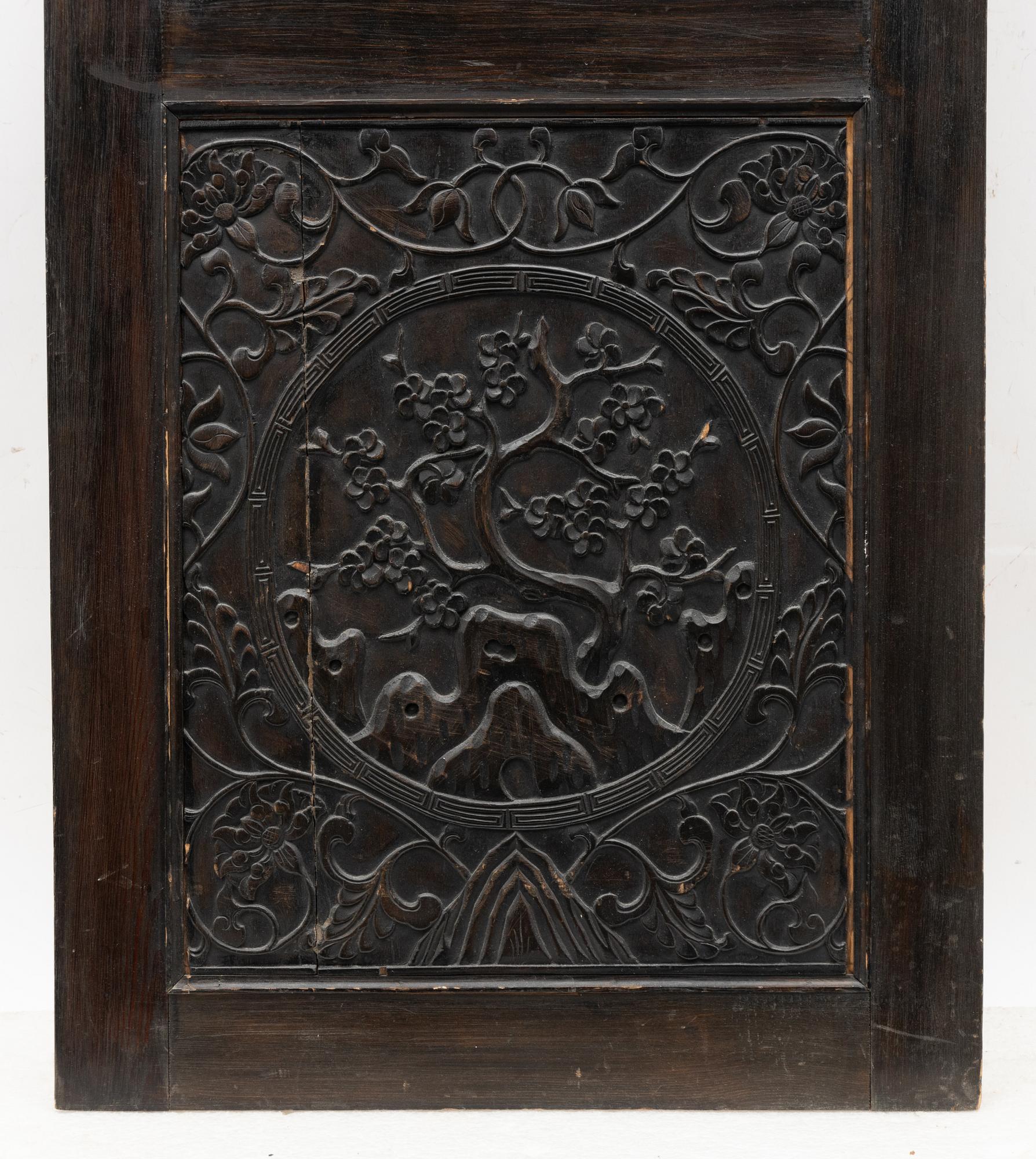 A Chinese wooden panel, Qing dynasty, 19th century.