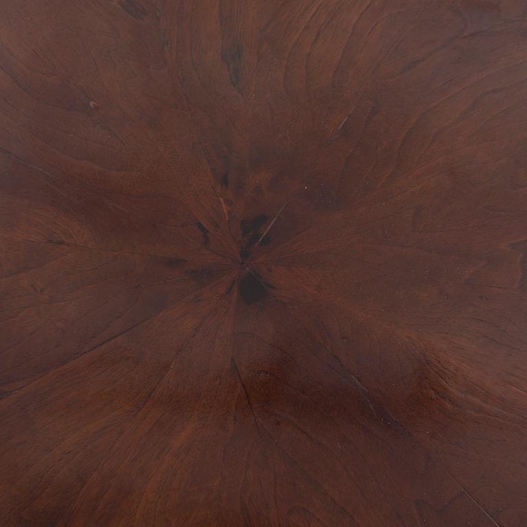AN ART DECO STYLE TABLE, from the middle of the 20th century.