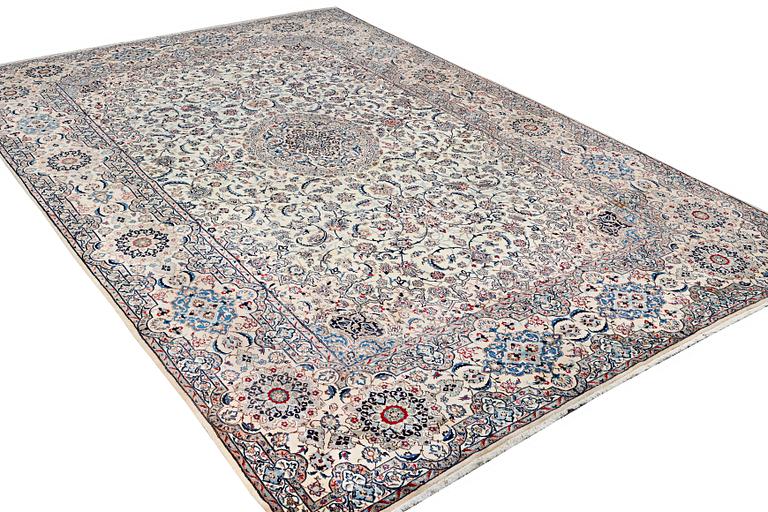 A Nain carpet, part islk, 9 laa, c. 453 x 298 cm.