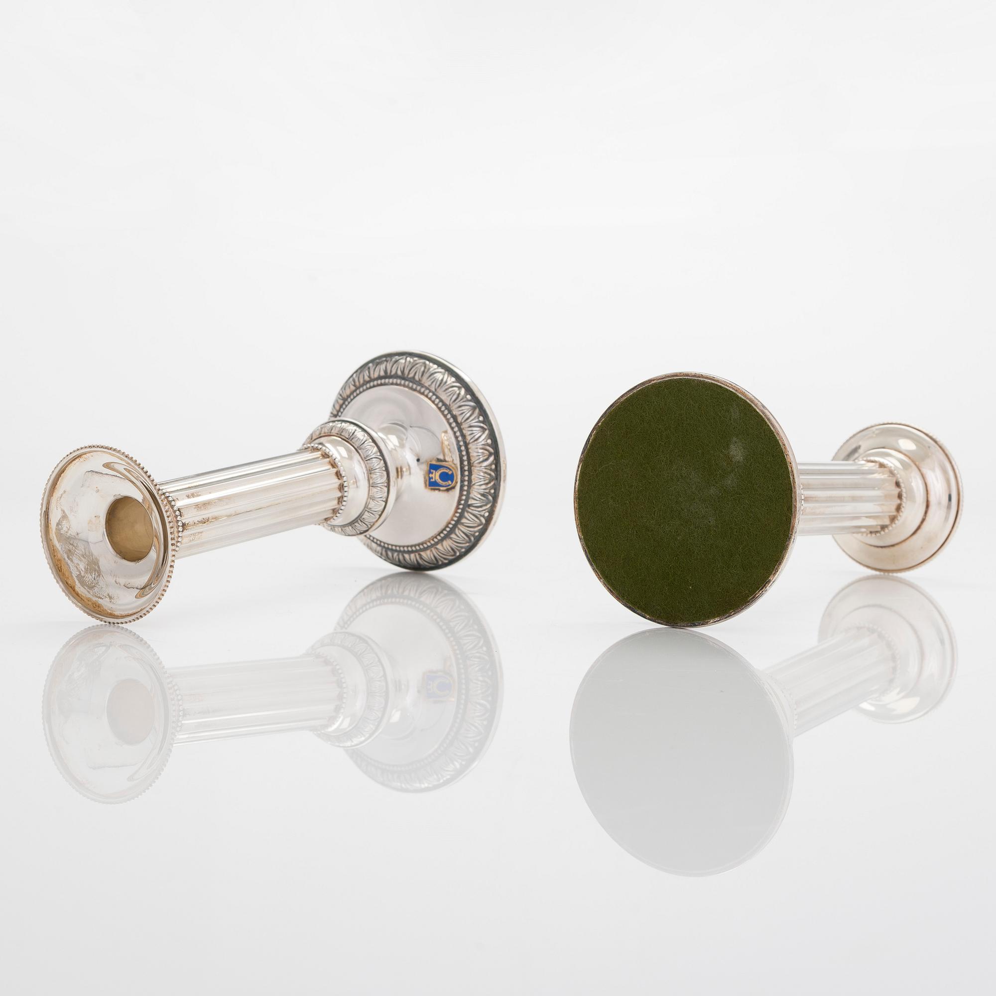 A pair of silver candlesticks, Kultateollisuus, Turku 1996 & 2000.