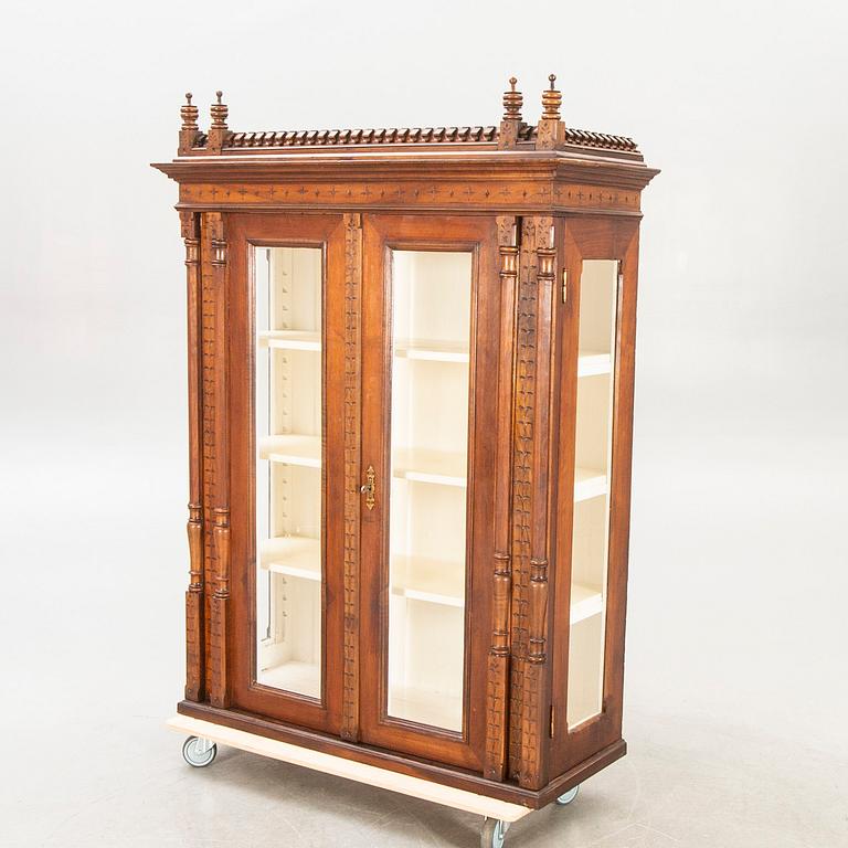 An early 1900s mahogany display cabinet.